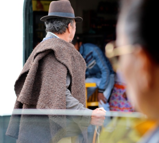 Colombian man with fedora and shawl